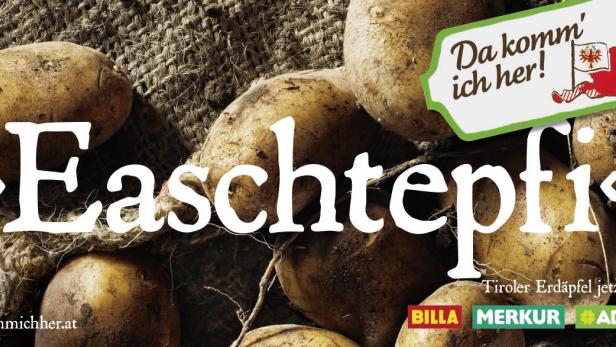 Mehrere Tiroler Erdäpfel liegen auf einem Jutesack.