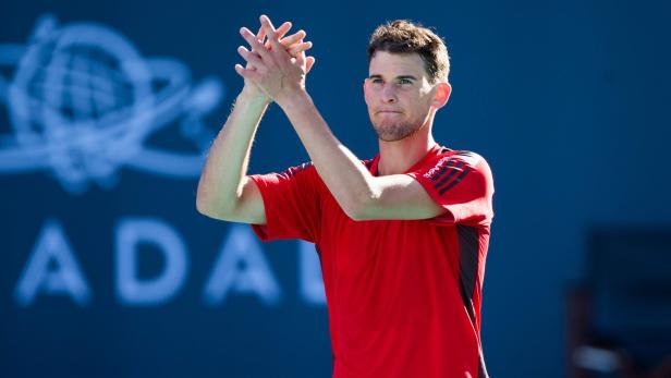 Austria&#039;s Dominic Thiem gestures after defeating Spain&#039;s Pablo Carreno Busta during the Mubadala World Tennis Championship 2017 match in Abu Dhabi, on December 30, 2017. / AFP PHOTO / NEZAR BALOUT