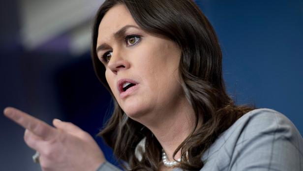 (FILES) This file photo taken on January 3, 2018 shows White House Press Secretary Sarah Sanders taking questions during the daily briefing at the White House in Washington, DC. The White House announced January 4, 2018 that its staff and visitors will no longer be allowed to use personal cell phones in the West Wing, the nerve center of the American executive branch. The personal mobile phone ban will go into effect next week, White House press secretary Sarah Sanders said. She cited security reasons for the move but it comes amid an uproar over published comments about President Donald Trump and his family by former top White House strategist Steve Bannon.&quot;The security and integrity of the technology systems at the White House is a top priority for the Trump administration,&quot; Sanders said. / AFP PHOTO / JIM WATSON
