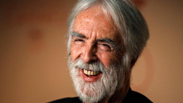 (FILES) This file photo taken on May 22, 2017 shows Austrian director Michael Haneke laughing during a press conference for the film &#039;Happy End&#039; at the 70th edition of the Cannes Film Festival in Cannes, southern France. Haneke&#039;s last movie &quot;Happy End&quot; is released on October 4, 2017, AFP reports. / AFP PHOTO / Laurent EMMANUEL