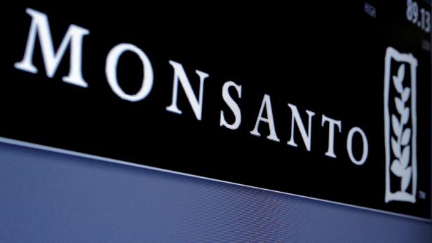 FILE PHOTO: The Monsanto logo is displayed on a screen where the stock is traded on the floor of the New York Stock Exchange (NYSE) in New York City, U.S., May 9, 2016. REUTERS/Brendan McDermid/File Photo