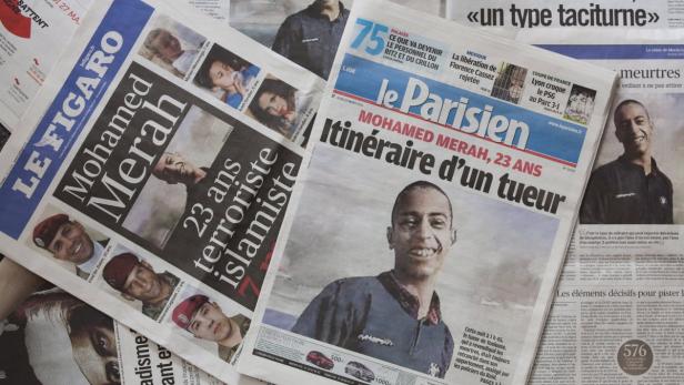 epa03154695 An illustration photo shows French national daily newspapers displaying, on 22 March 2012, front-page pictures of 24 year-old gunman Mohamed Merah who was killed after a 32-hour long standoff with police as they raided his appartment in Toulouse to apprehend him for his involvement in shootings which killed children and a rabbi on 19 March 2012 at a &#039;Ozar Hatorah&#039; Jewish school, as well as three French soldiers earlier in the week. EPA/IAN LANGSDON
