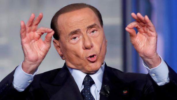 Ex-Premier Silvio Berlusconi, 81, (o.) ist zurück.