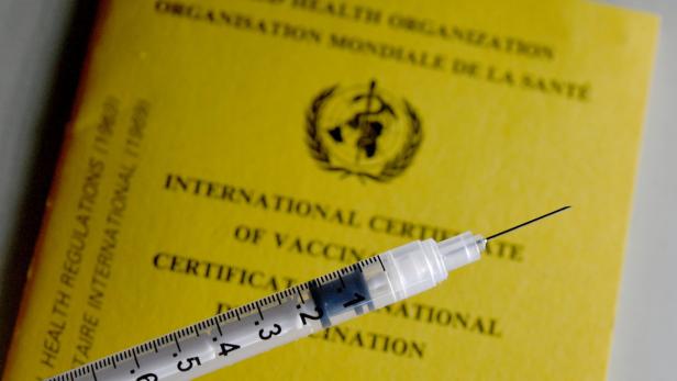 Impfnadel und Impfplan