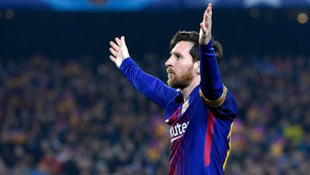 Barcelona&#039;s Argentinian forward Lionel Messi celebrates after scoring a goal during the UEFA Champions League round of sixteen second leg football match between FC Barcelona and Chelsea FC at the Camp Nou stadium in Barcelona on March 14, 2018. / AFP PHOTO / LLUIS GENE