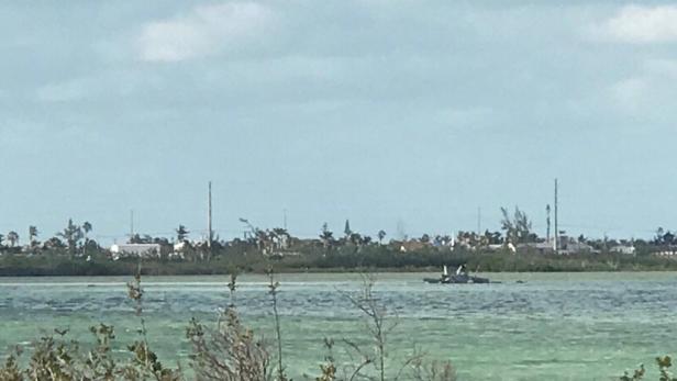A U.S. Navy jet is seen after it crashed near Naval Air Station Key West off the coast the Florida Keys, in this picture taken from social media, March 14, 2018. Barbie Wilson/via REUTERS THIS IMAGE HAS BEEN SUPPLIED BY A THIRD PARTY. MANDATORY CREDIT.NO RESALES. NO ARCHIVES