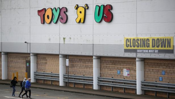 FILE PHOTO: Closing down signs are seen outside the Toys R Us store in Coventry, Britain, March 13, 2018. REUTERS/Hannah McKay/File Photo