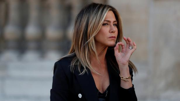 Actress Jennifer Aniston arrives to attend a dinner organized by French luxury group Louis Vuitton for the launching of new leather accessories in Paris, France, April 11, 2017. REUTERS/Gonzalo Fuentes