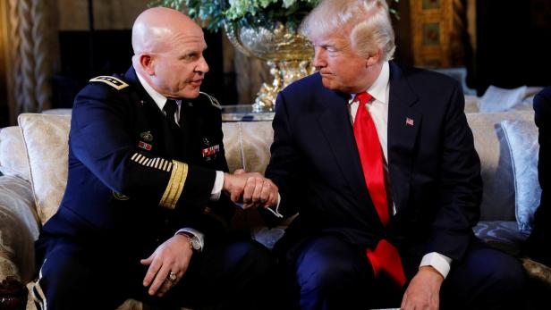 FILE PHOTO - U.S. President Donald Trump shakes hands with his new National Security Adviser Army Lt. Gen. H.R. McMaster after making the announcement at his Mar-a-Lago estate in Palm Beach, Florida U.S. February 20, 2017. REUTERS/Kevin Lamarque/File Photo