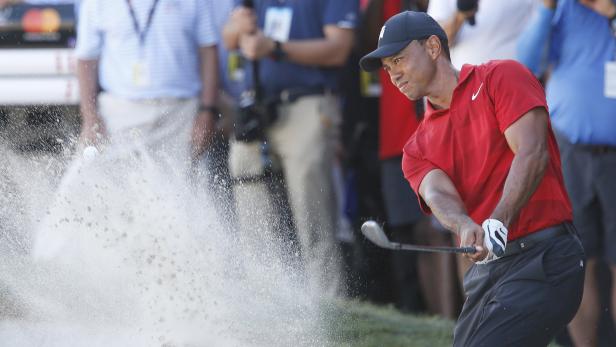 Mar 18, 2018; Orlando, FL, USA; Tiger Woods hits from the bunker on the 17th hole during the final round of the Arnold Palmer Invitational golf tournament at Bay Hill Club &amp; Lodge. Mandatory Credit: Reinhold Matay-USA TODAY Sports