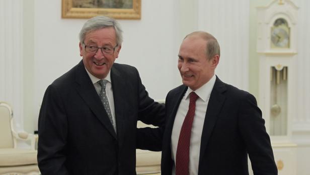 Präsident Putin (r.) freut sich auf EU-Kommissionspräsident Juncker