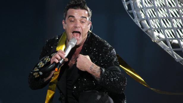 Robbie Williams unterhielt am Mittwochabend 65.000 Fans in der Wiener Krieau. Eindrücke vom Konzert des Entertainers.