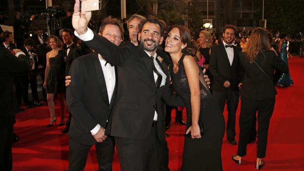Jury President of Film selection "Un Certain Regard" Pablo Trapero and his wife Martina Gusman pose on the red carpet for the screening of the film "Relatos salvajes" in competition at the 67th Cannes Film Festival in Cannes