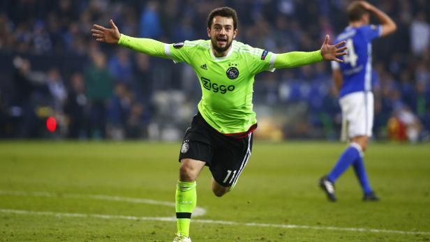 Ajax's Amin Younes celebrates after the match