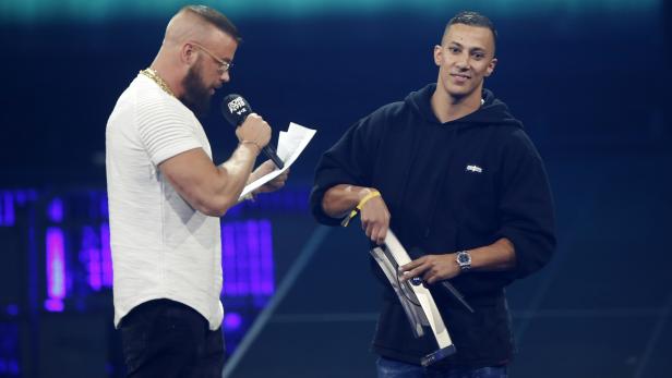 AustralianGerman rappers Kollegah & Farid Bang receive the "National Hip-Hop/Urban" award during the 2018 Echo Music Award ceremony in Berlin