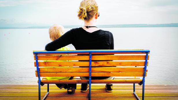 mother and child resting at Lake Constance
