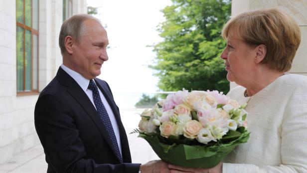 Putin und Merkel im vergangenen Mai in Sotschi.