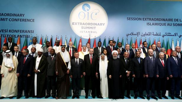 Leaders and representatives of the Organisation of Islamic Cooperation (OIC) member states pose for a group photo during an extraordinary meeting in Istanbul