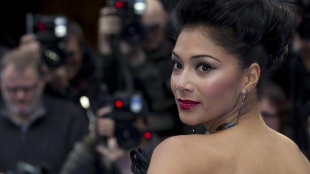 dapdActress Nicole Scherzinger poses for the cameras as she arrives for the UK Premiere of the film "Men In Black 3" in London, Wednesday, May 16, 2012. (Foto:Alastair Grant/AP/dapd)