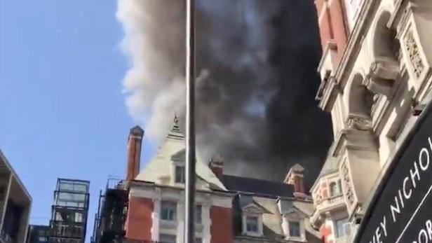 A blaze is seen at the Mandarin Oriental Hotel in Knightsbridge, London