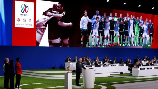 Delegates watch the presentation of the joint bid of United States, Canada and Mexico to host the 2026 FIFA World Cup during the 68th FIFA Congress in Moscow