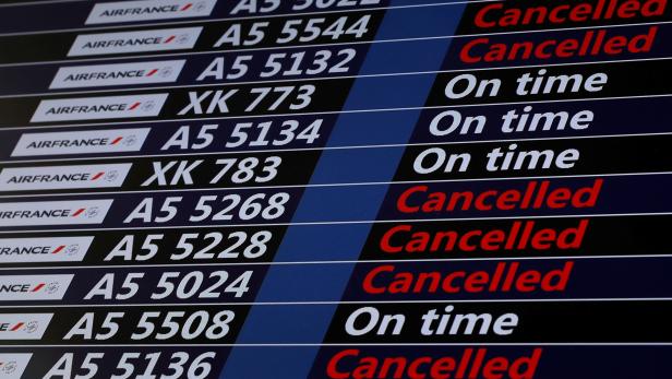 A flight departure screen displays a series of flight cancellations at Orly Airport near Paris as Air France pilots, cabin and ground crews unions call for a strike over salaries A flight departure screen displays a series of flight cancellations at Orly Airport near Paris as Air France pilots, cabin and ground crews unions call for a strike over salaries