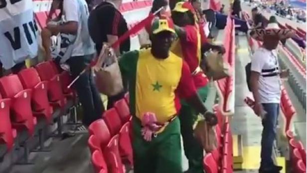 Senegal-und Japan-Fans reinigten nach Match das Stadion