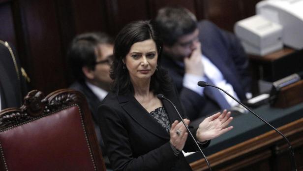 epa03627227 The new president of Italy&#039;s lower house of parliament, Laura Boldrini, is seen after being elected in Rome, Italy, 16 March 2013. Boldrini, a former UN refugee agency official and a passionate advocate for migrants&#039; rights, was elected 16 March president of Italy&#039;s lower house of parliament. She is a first-time deputy for the Left, Ecolocy and Freedom (SEL) party, who was also supported by the Democratic Party (PD), the biggest faction in the centre-left alliance that won the February 24-25 elections by a whisker. EPA/STR