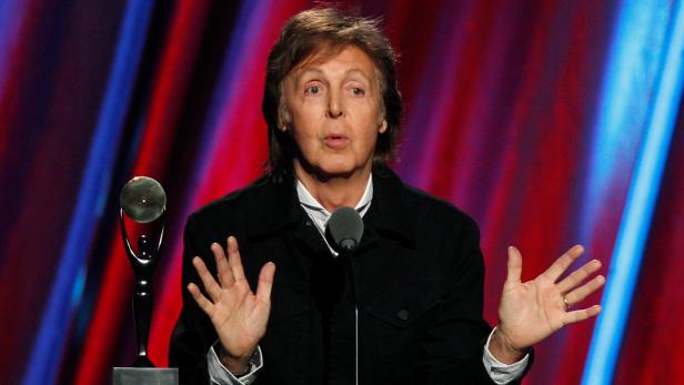 FILE PHOTO - Paul McCartney speaks as he inducts Ringo Starr during the 2015 Rock and Roll Hall of Fame Induction Ceremony in Cleveland