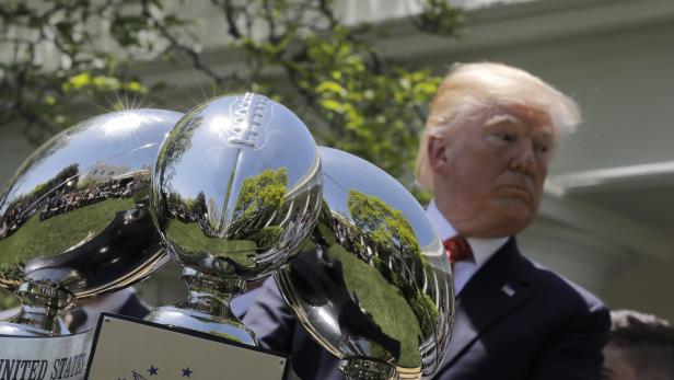 U.S. President Trump presents the Commander-in-Chief's Trophy to the U.S. Military Academy football team at the White House in Washington