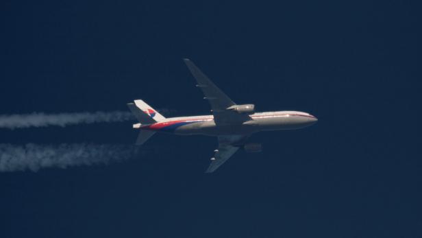FILE PHOTO: Malaysian Airlines Boeing 777 with the registration number 9M-MRO flies over Poland