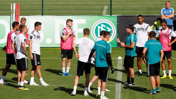 FILE PHOTO: Germany coach Joachim Loew with his players during training in Eppan, Italy - May 26, 2018