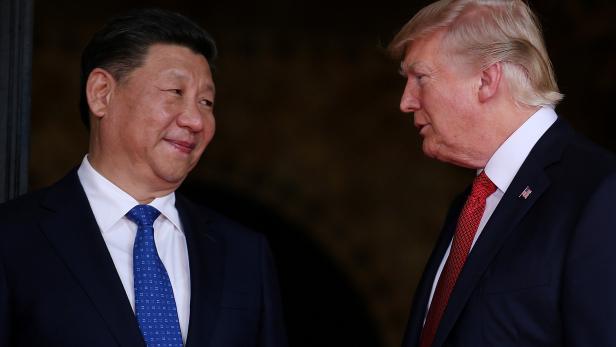 FILE PHOTO: U.S. President Donald Trump welcomes Chinese President Xi Jinping at Mar-a-Lago state in Palm Beach