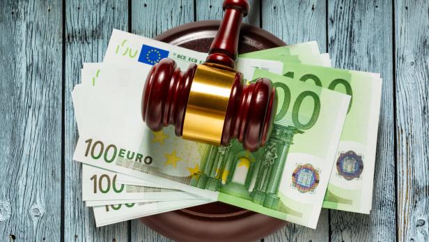 Judge's gavel and one hundred euro banknotes