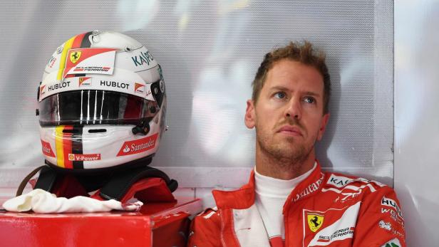 Sieht so ein Sieger aus? Ferrari-Pilot Sebastian Vettel ist im Titelrennen unter Druck geraten.