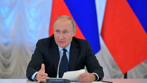Russia's President Putin chairs a meeting on fuel and energy issues in Kemerovo Region