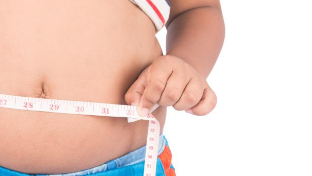 Body belly of Boy Fat With Measuring Tape