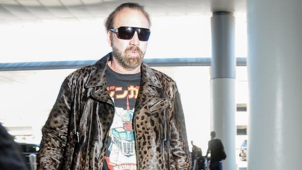 Star-Looks: Nicolas Cage im Leo-Outfit und Heidi im Vogel-Look