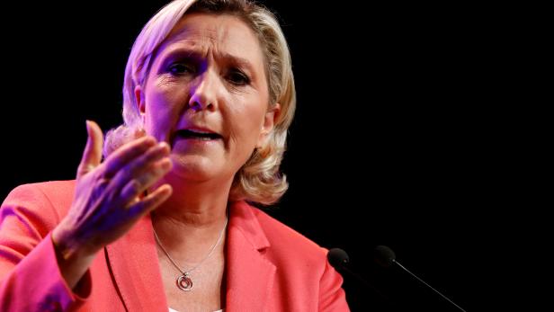 French far-right National Rally (Rassemblement National) party leader Marine Le Pen delivers her speech in Mantes-la-Ville