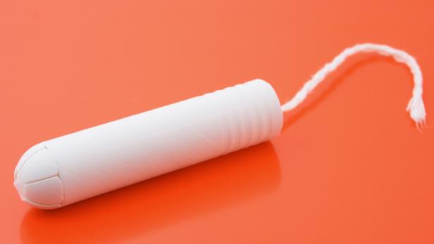 Tampon isolated on an orange background