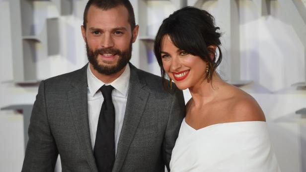 BRITAIN-ENTERTAINMENT-FILM Jamie Dornan mit seiner Ehefrau Amelia Warner im Februar 2017.