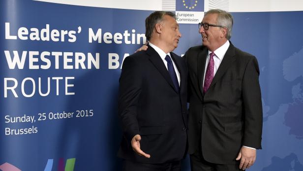 EU Commission President Juncker welcomes Hungary's PM Orban  during a meeting over the Balkan refugee crisis with leaders from central and eastern Europe in Brussels