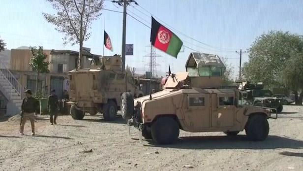 Still image taken from video showing security Humvees near a site attacked by Taliban in Sayeed Abad district, Wardak Province
