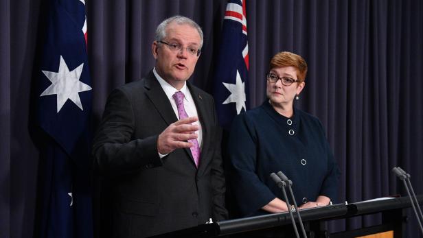 Prime Minister Scott Morrison speaks to the media alongside Minister for Foreign Affairs Marise Payne during a news conference in Canberra