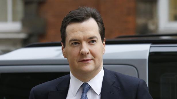 Britain&#039;s Chancellor of the Exchequer, George Osborne, arrives at Millbank broadcast studios in central London March 21, 2013. Osborne delivered his annual budget to the House of Commons on Wednesday. REUTERS/Olivia Harris (BRITAIN - Tags: POLITICS BUSINESS)