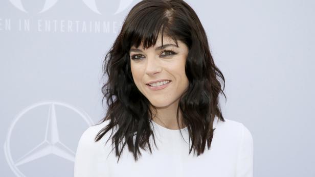 Actress Selma Blair poses at The Hollywood Reporter's Annual Women in Entertainment Breakfast in Los Angeles