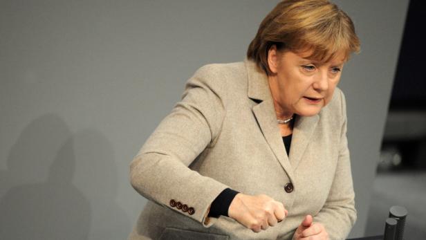 Merkel kündigt erstmals Verhandlungen mit FDP und Grünen an