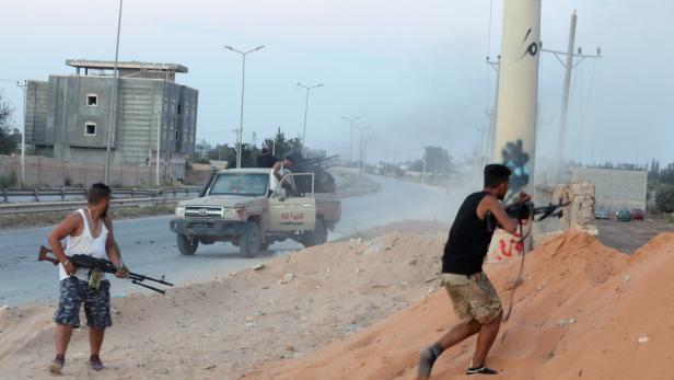 FILE PHOTO: Armed forces allied to internationally recognised government fight with armed group in Tripoli