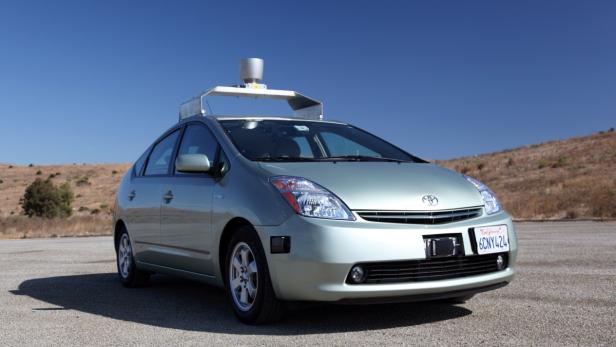 epa03211046 A Handout photograph released by Google on 08 May 2012 showing a Toyota Prius self-driving car. News reports state that Google has obtained a license in the state of Nevada, which changed its laws in March to allow self-drive cars, to operate the vehicle. EPA/GOOGLE / HO HANDOUT EDITORIAL USE ONLY/NO SALES