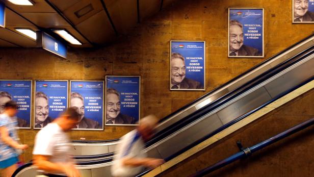 FILE PHOTO: Hungarian government poster portraying financier George Soros in Budapest
